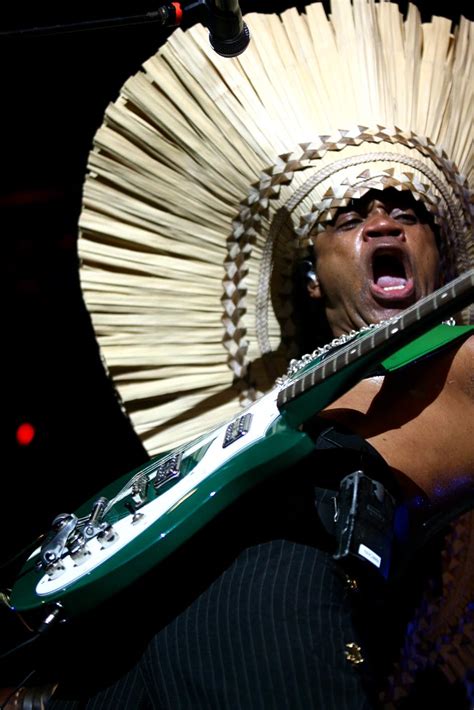 Carlinhos Brown in Concert: A Fusion of Samba Soul and Global Rhythms!